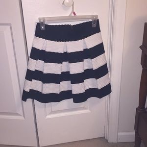 Francesca’s pleated skirt